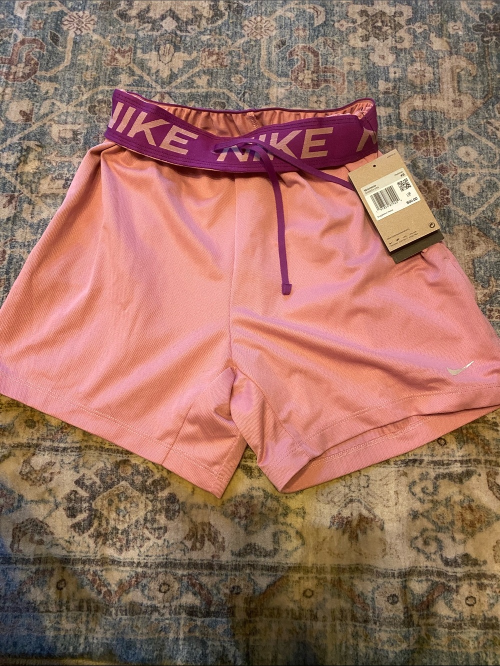 Nike Women’s Pink Athletic Shorts with Purple Branded Waistband